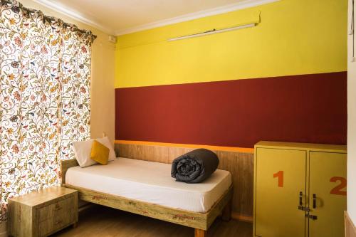 Ein Bett oder Betten in einem Zimmer der Unterkunft Zostel Srinagar