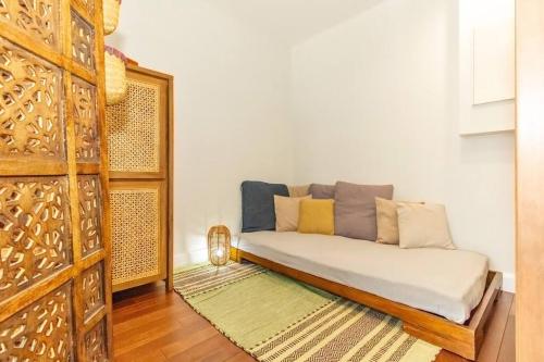 Postel nebo postele na pokoji v ubytování Exotica - En plein cœur de St Gilles les Bains