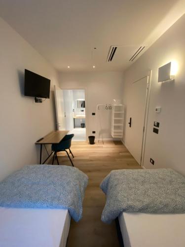 TV a/nebo společenská místnost v ubytování Prato della Valle Apartments