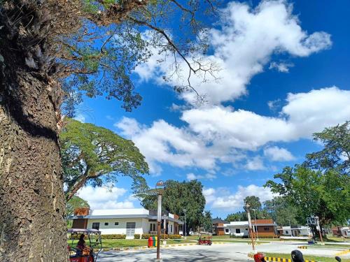 a view of a street with a blue sky at Aurora Villas and Cabin Resort in Clark