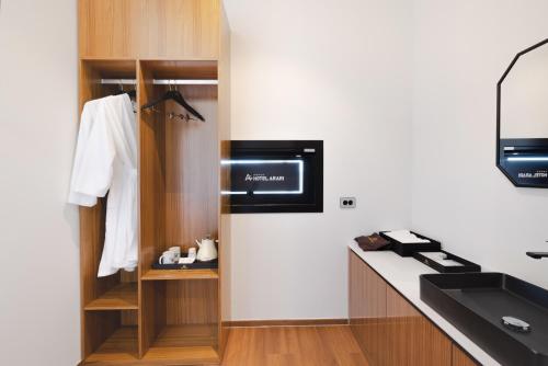 a kitchen with a sink and a counter top at Hotel Arari in Jeonju