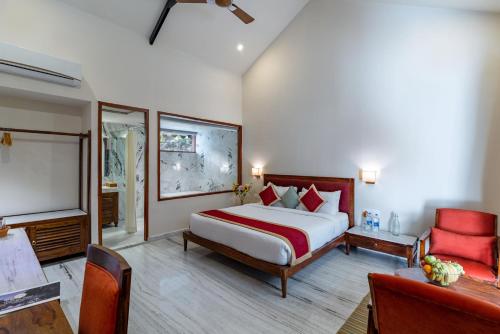 Letto o letti in una camera di Aranya Vilas - A Nature Resort
