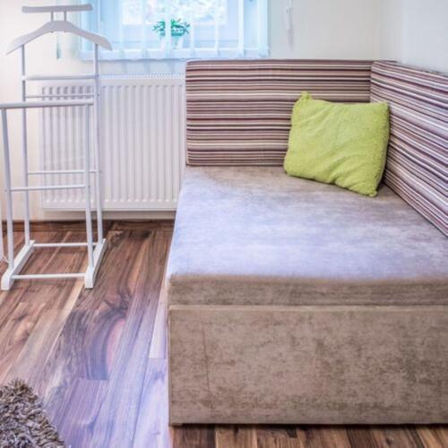 Ένα ή περισσότερα κρεβάτια σε δωμάτιο στο Ariel apartman
