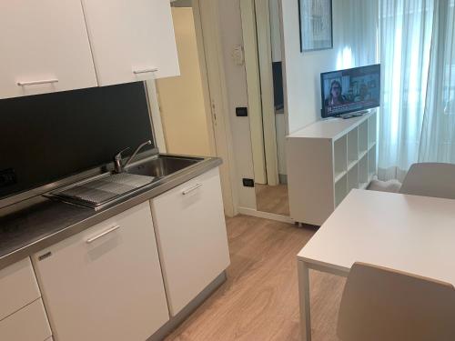 Kuchyň nebo kuchyňský kout v ubytování Residence Aida