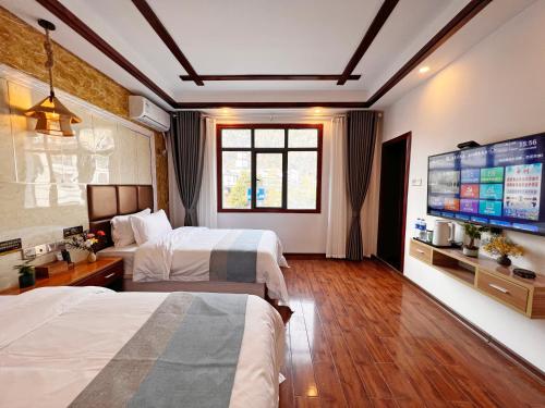 Cama o camas de una habitación en Yijingju Humanistic Inn
