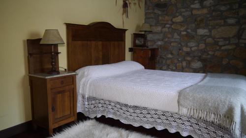 Voodi või voodid majutusasutuse Casa Rural Garro toas