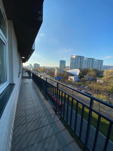a balcony of a building with a view of a city at TIFFANY Apartment Hotel in Bratislava
