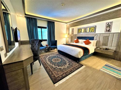 Postel nebo postele na pokoji v ubytování Petra Canyon Hotel