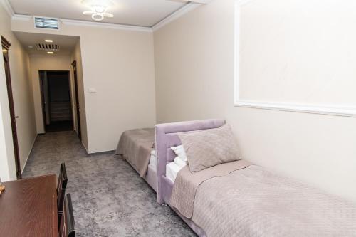 Letto o letti in una camera di Villa ACAEM