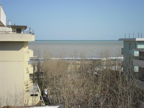 a view of a body of water from a building at Hotel Busignani in Rimini