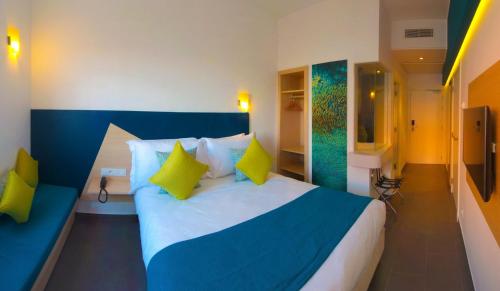 Kama o mga kama sa kuwarto sa Hotel Relax Marrakech