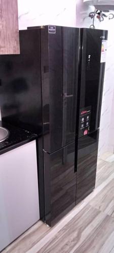 Η κουζίνα ή μικρή κουζίνα στο Fadi Appartement F4