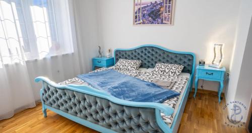 Una cama o camas en una habitación de Vila Santorini Nacionalni Park Fruška Gora