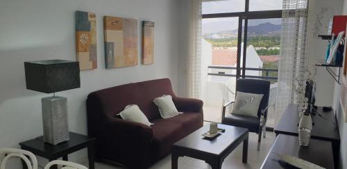 TV a/nebo společenská místnost v ubytování Garajonay II, Los Cristianos