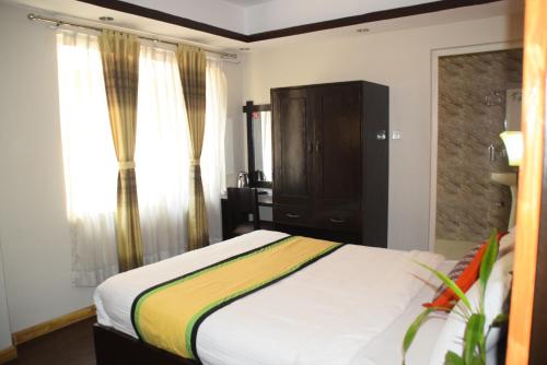 Кровать или кровати в номере twin bedroom in Thamel- 850 meters from Kathmandu durbar square
