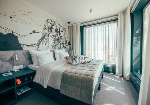 Ένα ή περισσότερα κρεβάτια σε δωμάτιο στο Hotel AX