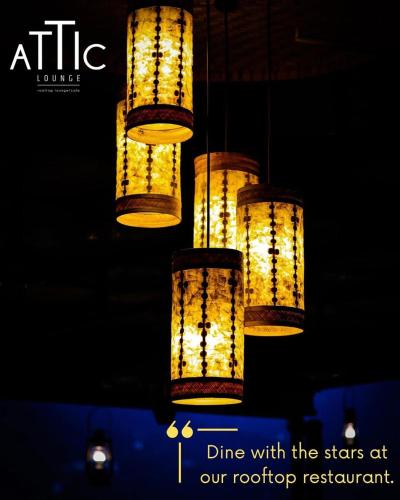 a group of chandeliers hanging from a ceiling at Five Gangtok in Gangtok
