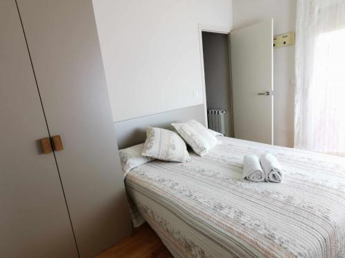 Tempat tidur dalam kamar di Casa acogedora y confortable