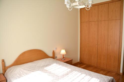 Ένα ή περισσότερα κρεβάτια σε δωμάτιο στο Premium Apartments Baku