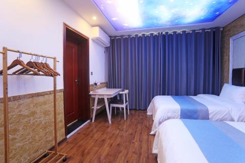 Cama o camas de una habitación en Yijingju Humanistic Inn