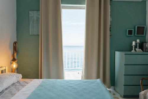 Posteľ alebo postele v izbe v ubytovaní Sea View apartment Dione