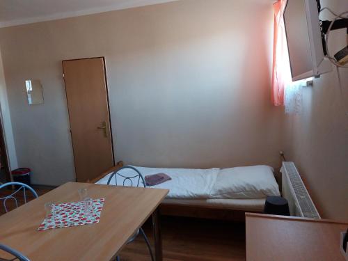 Posteľ alebo postele v izbe v ubytovaní Penzion Flipper