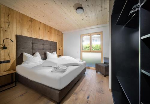 Postel nebo postele na pokoji v ubytování ad-fontanas Appartements Vandans