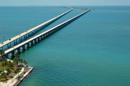 an aerial view of a bridge over the water at PARADISE AT SUNSET in Marathon