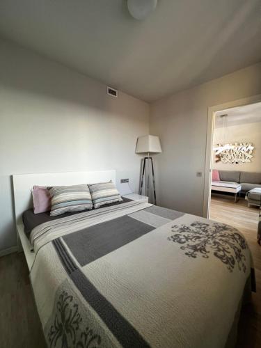 Katil atau katil-katil dalam bilik di Apartment CP Poblenou