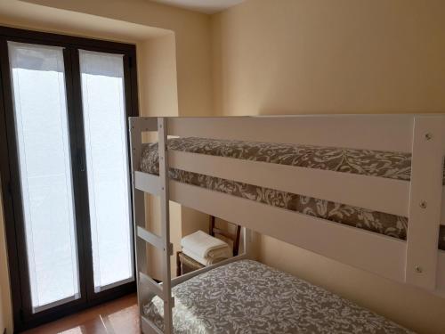 Postel nebo postele na pokoji v ubytování Appartamento Sophie LT