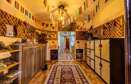 a kitchen with a rug on the floor at Hakaia Community in Aqaba