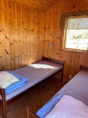 Postel nebo postele na pokoji v ubytování Delsbo Camping