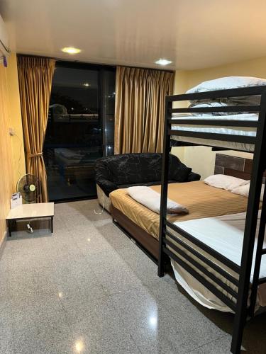 Postel nebo postele na pokoji v ubytování Baan1668 Hometel near Chinatown One Bangkok