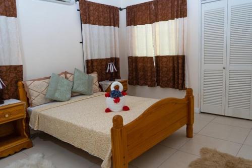 a bedroom with a bed with a snowman on it at Smart villa @ Richmond in Richmond