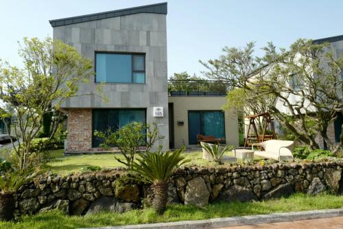 Zahrada ubytování Jeju TheRiche Pension