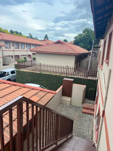 a view from a balcony of a house at Just Bed & bath by mama R in Newcastle