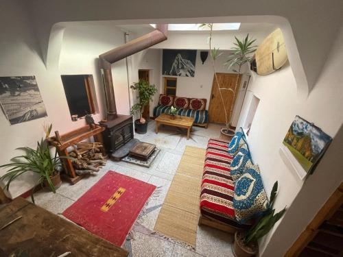 an overhead view of a living room with a couch at SALAS waveclimbing company in Sidi Ifni