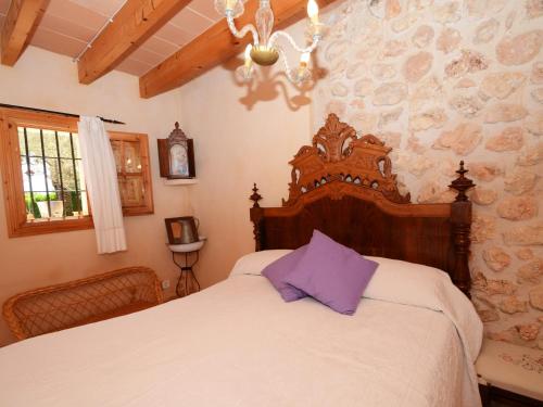 A bed or beds in a room at Can Rovey, pool and gardens in Inca