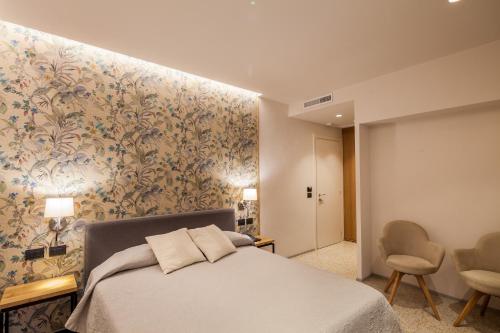 Ένα ή περισσότερα κρεβάτια σε δωμάτιο στο Hotel La Palomba