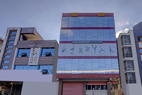a building with a mural on the side of it at Hotel O Compact Studio Kr Puram Near Phoenix Marketcity in Bengaluru