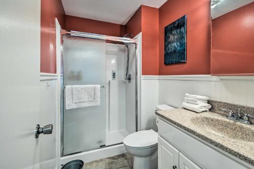 a bathroom with a shower and a toilet and a sink at Charming Cave City Vacation Rental with Fire Pit! in Cave City