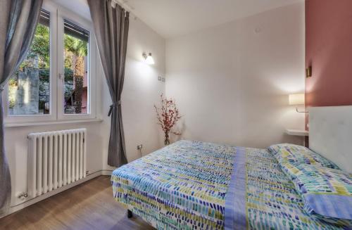 Ένα ή περισσότερα κρεβάτια σε δωμάτιο στο Margherita House