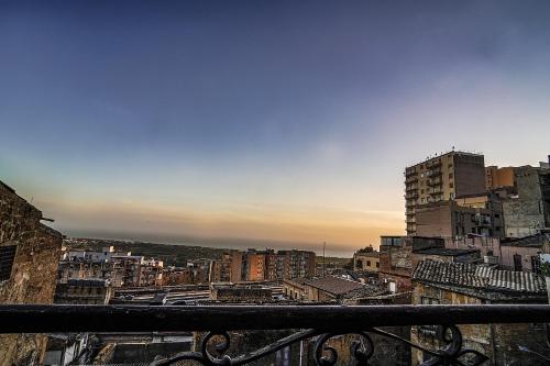 a view of a city from a balcony at Casa Lerux in Agrigento
