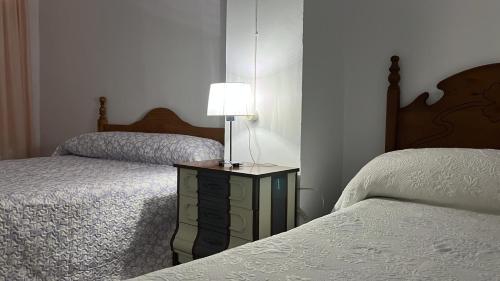Posteľ alebo postele v izbe v ubytovaní CASA FUENTE DEL MOLINO DE LA IRUELA
