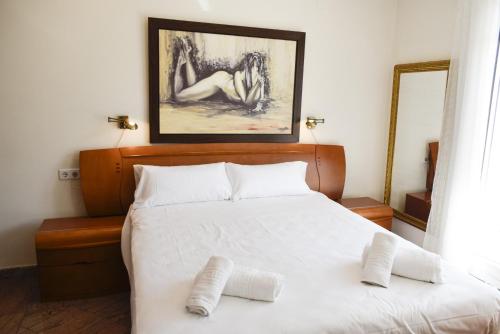 Postel nebo postele na pokoji v ubytování Anacasa Vistamar Denia Centro AT2156