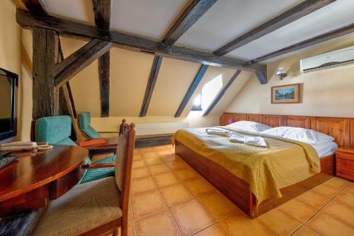 מיטה או מיטות בחדר ב-Betlem Club Hotel