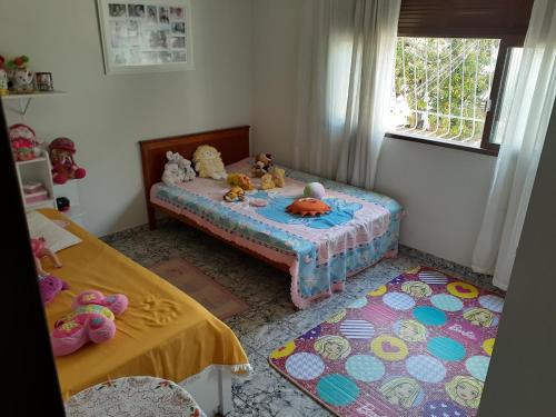 Tempat tidur dalam kamar di Venda Nova do imigrante