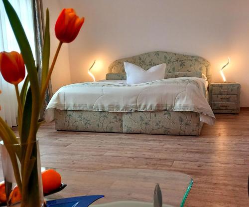 מיטה או מיטות בחדר ב-Hotel Schloßschenke