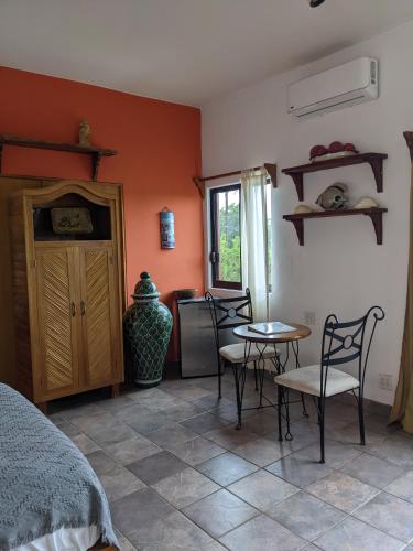 Ένα ή περισσότερα κρεβάτια σε δωμάτιο στο Hacienda De Palmas
