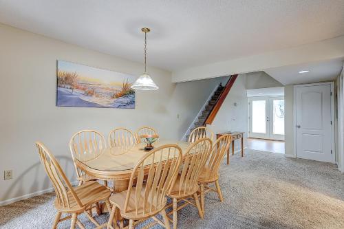 a dining room with a table and chairs at Egrets Pointe, Unit 492 in Edisto Island